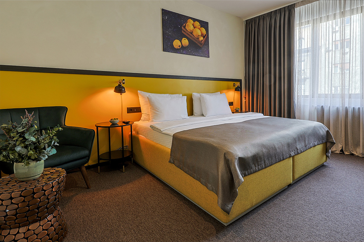 Hotel Botanica – Family Room Bedroom Comfortable Family Room with double bed at Hotel Botanica Belgrade