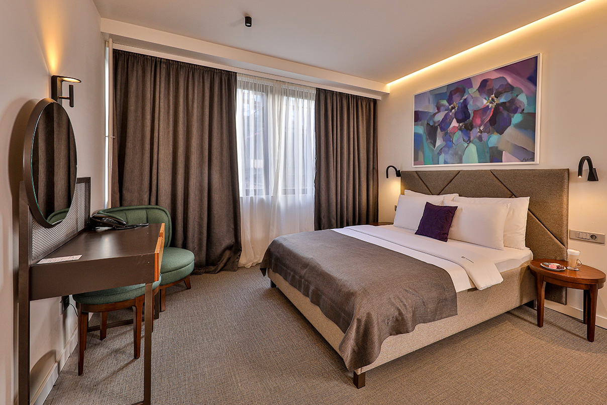 Hotel Botanica – Family Room Family Room at Hotel Botanica with spacious interior and comfortable double bed