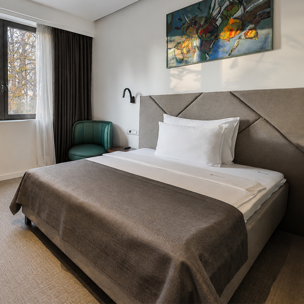 Single Room at Hotel Botanica Belgrade with comfortable single bed and modern interior