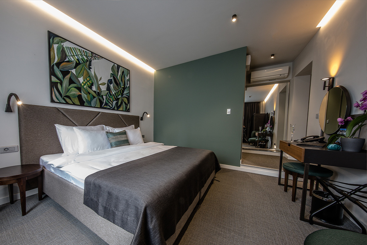 hotel-botanica-superior-double-room-belgrade3 Spacious Superior Double Room at Hotel Botanica with modern interior and seating area